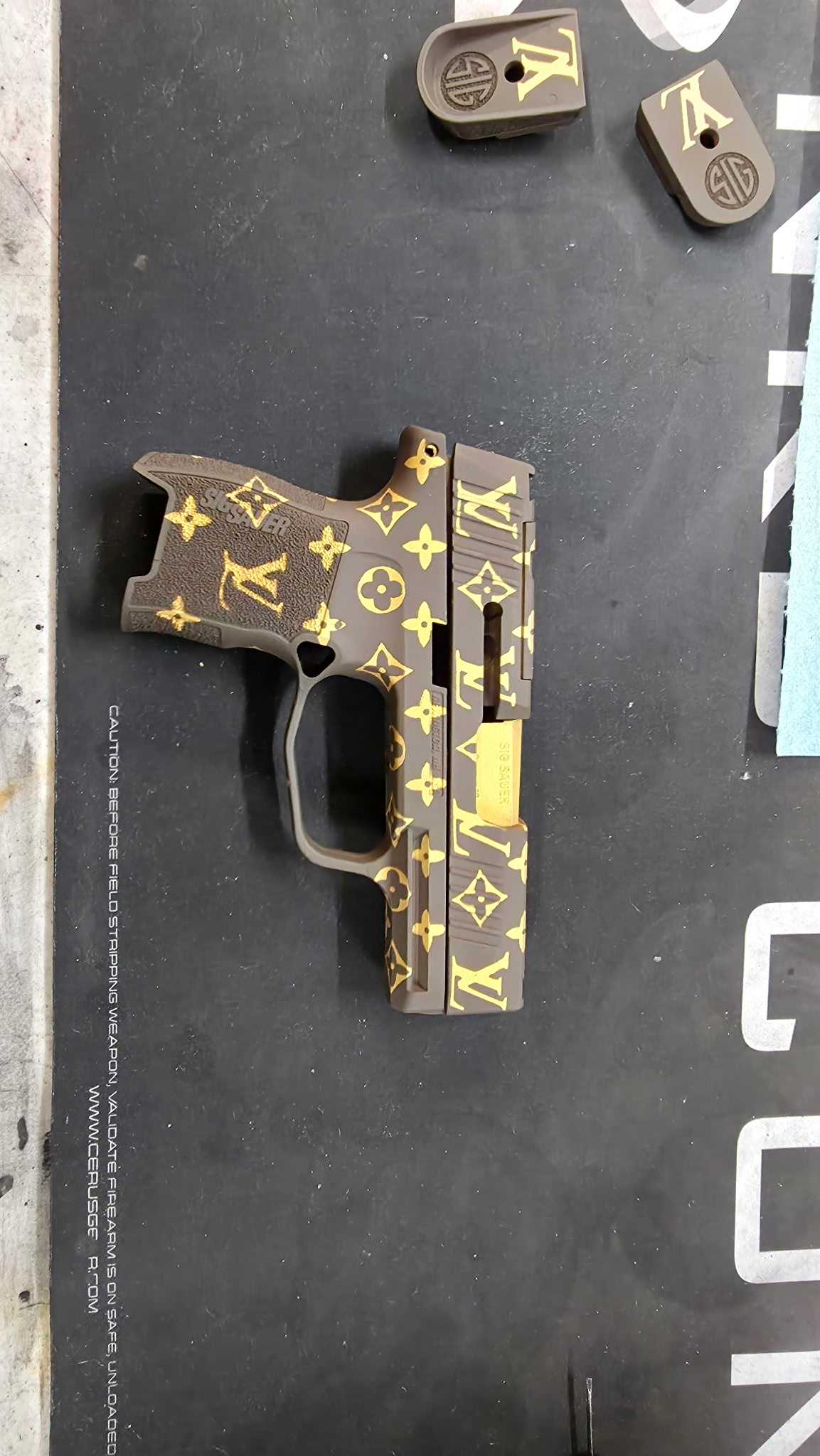 Orange Cerakote rifle by Wet Mountain Coatings
